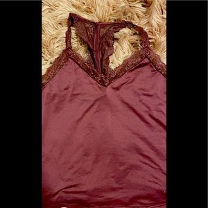 Never worn women’s bodysuit burgundy in color